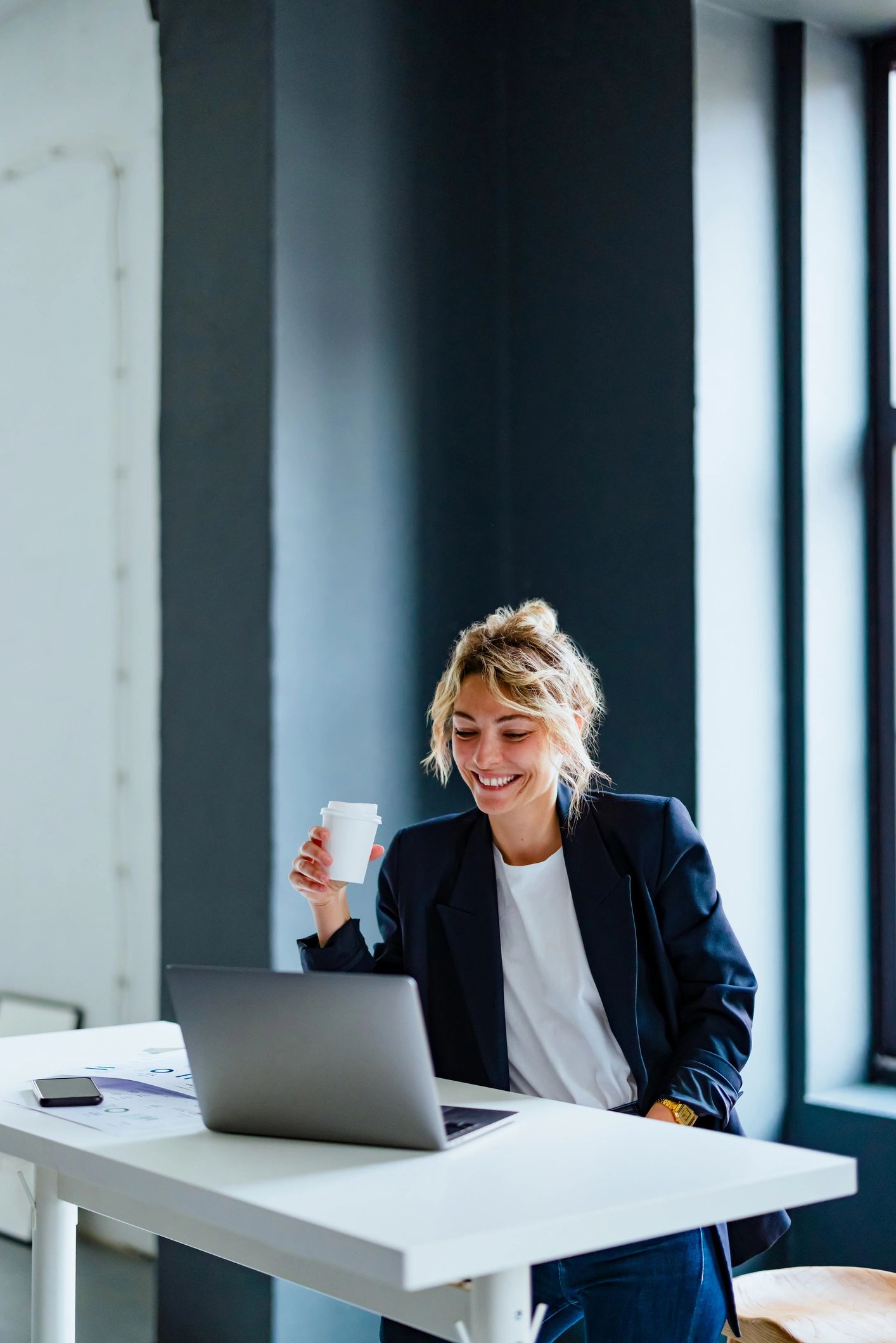 Professional virtual assistant working remotely on a laptop